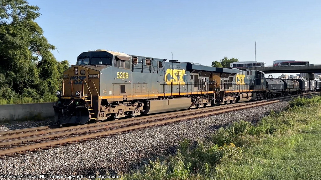 CSX 5209 leads M369.